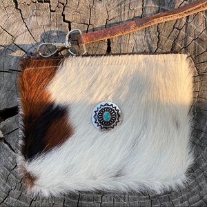 Cowhide Wristlet with turquoise concho